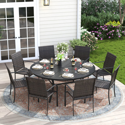 Outdoor Dining Set with 63“ Round Dining Table and Stackable Rattan Armrest Chairs