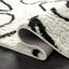 Tapis abstrait ivoire et noir Kituku-1483547930
