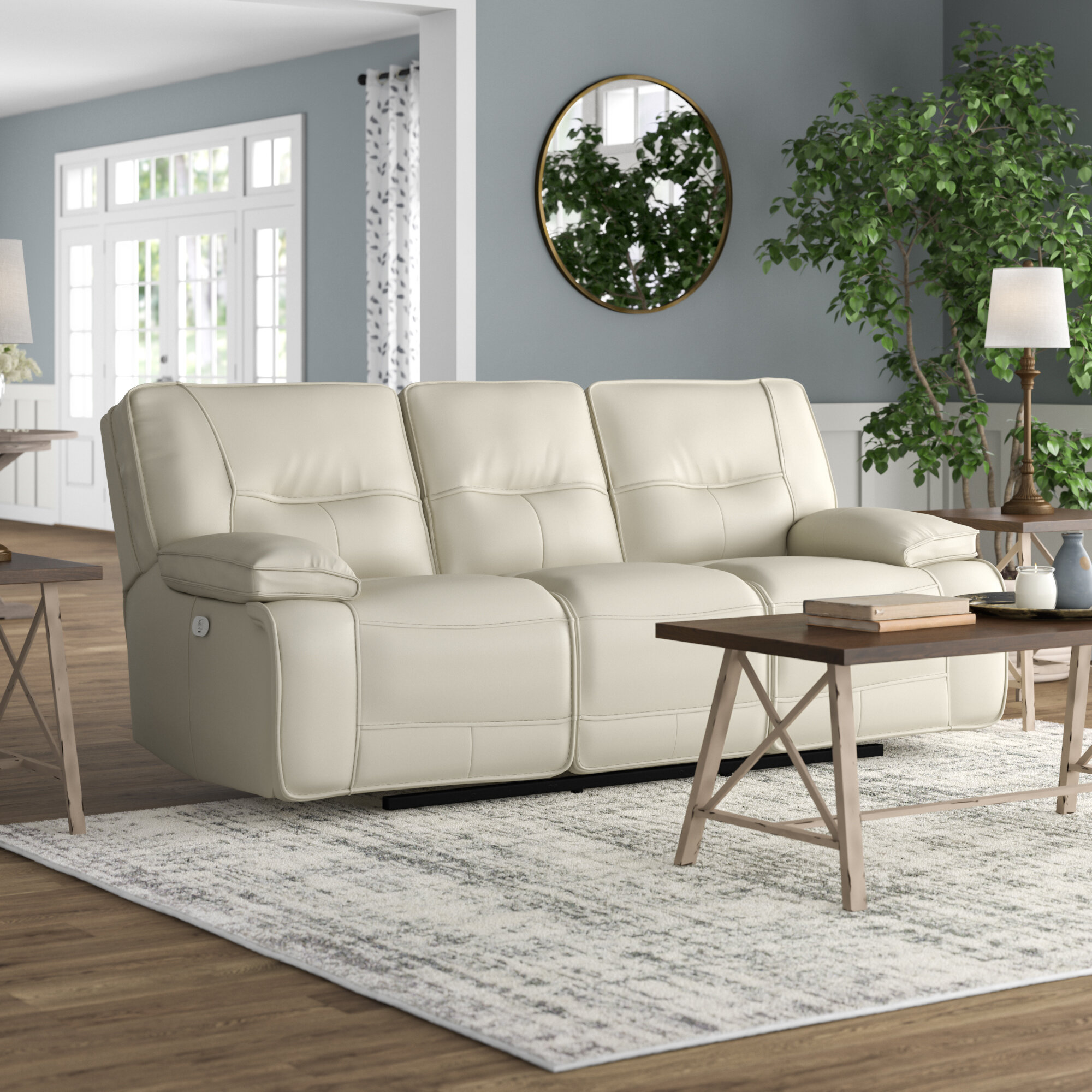 Cream colored deals leather reclining sofa