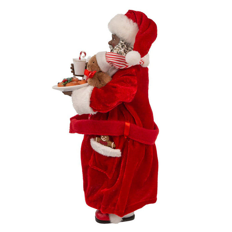 Festive Santa Claus Figurine in Pajamas with Cookies