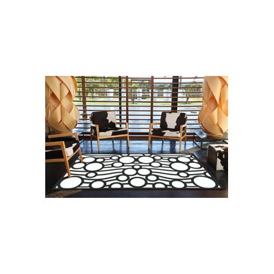 Tapis rond rond à motif peint