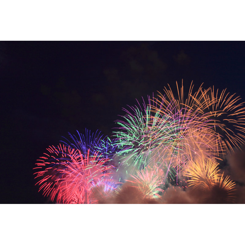 Fireworks In Night Sky by Yankane - Wrapped Canvas Print, 30cm H x 46cm W