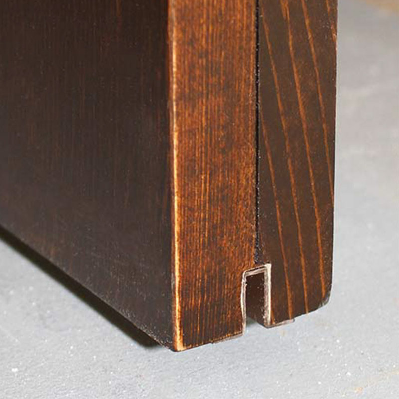 Guide de plancher pour portes en bois