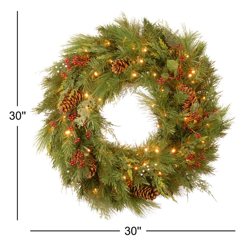 The Holiday Aisle® 30 in. White Pine Wreath with Battery Operated Warm White LED Lights