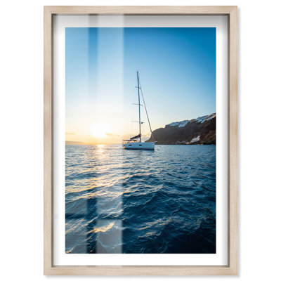 Voilier au coucher du soleil