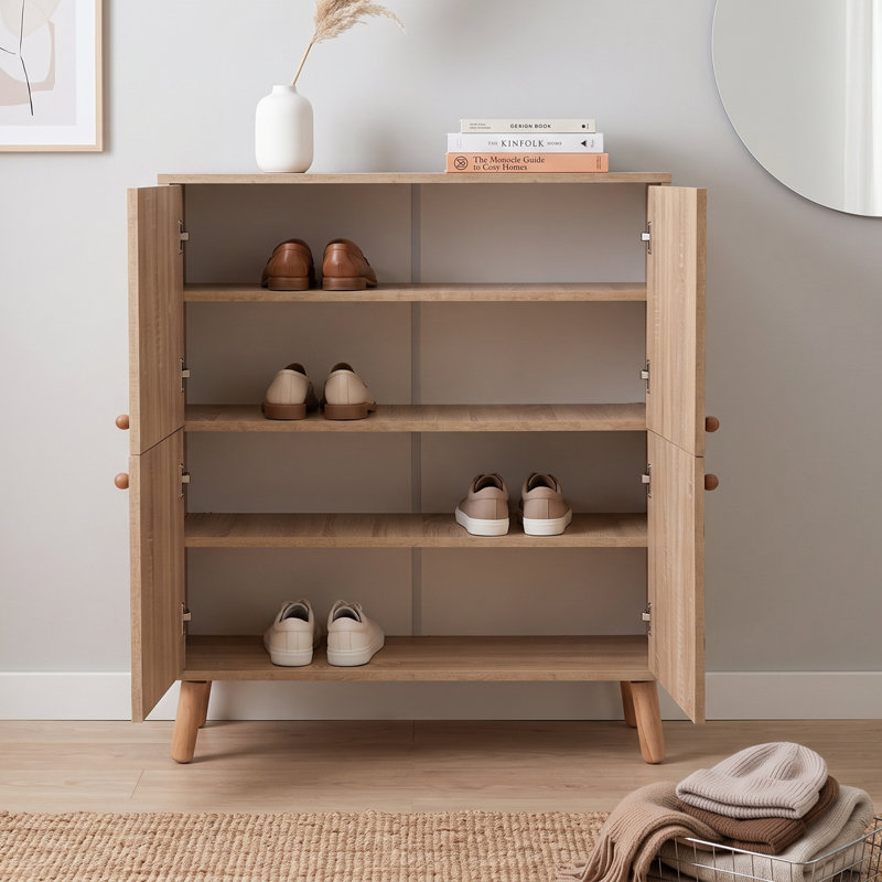 Commode décorative avec 4 armoires et pieds en bois