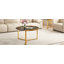 Ensemble de deux tables basses gigognes rondes au style glamour moderne, avec structure en métal doré et plateaux en verre noir.-1282441092-1282441094