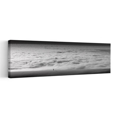 Solitary Figure Above Clouds by Fotoea - Wrapped Canvas Panoramic Print