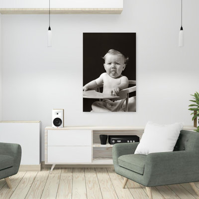 «1930S 1940S», Portrait d'un bébé tirant la langue, regardant un appareil photo classique rétro rétro, art mural