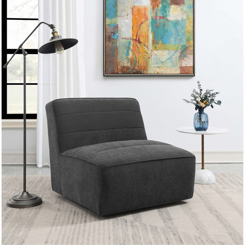 Fauteuil pivotant gris foncé capitonné