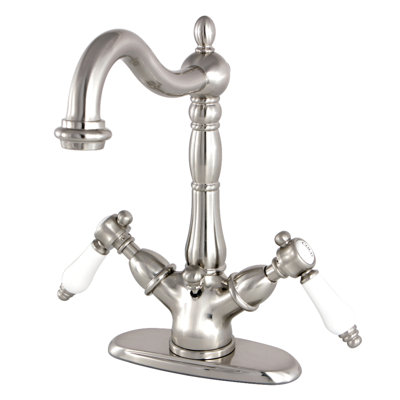 Kingston Brass Bel-Air Two-Handle 1-or-3 Hole Deck Mount Bathroom Faucet with Brass Pop-Up