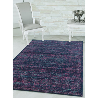 Tapis bleu à motif médaillon