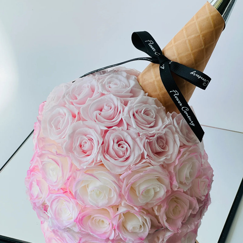 Arrangement de roses en boîte