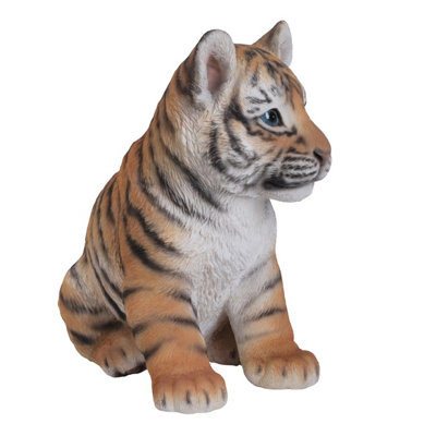 Figurine de l’cub assis