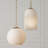 13.75" W x 15.25" H 1-Light Globe Pendant in Matte Brass with Soft White Glass and Alternating Loop Designer Chain
