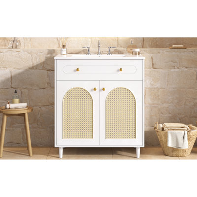 Meuble-lavabo de 76 cm avec lavabo en céramique, structure en bois massif, tablette réglable et panneaux avant pour un rangement moderne et polyvalent.
