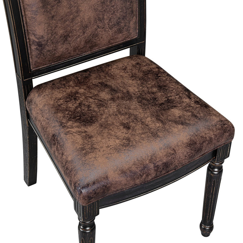 Ensemble de cuisine 5 pièces avec 4 chaises de salle à manger en polyester texturé brun, dossier haut et une table de cuisine moderne au fini noir sablé.