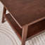 Table basse rectangulaire en bois massif avec tablette de rangement inférieure, idéale pour le salon, la maison, un appartement ou un bureau.