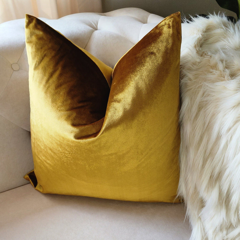 Housse de coussin en velours doré