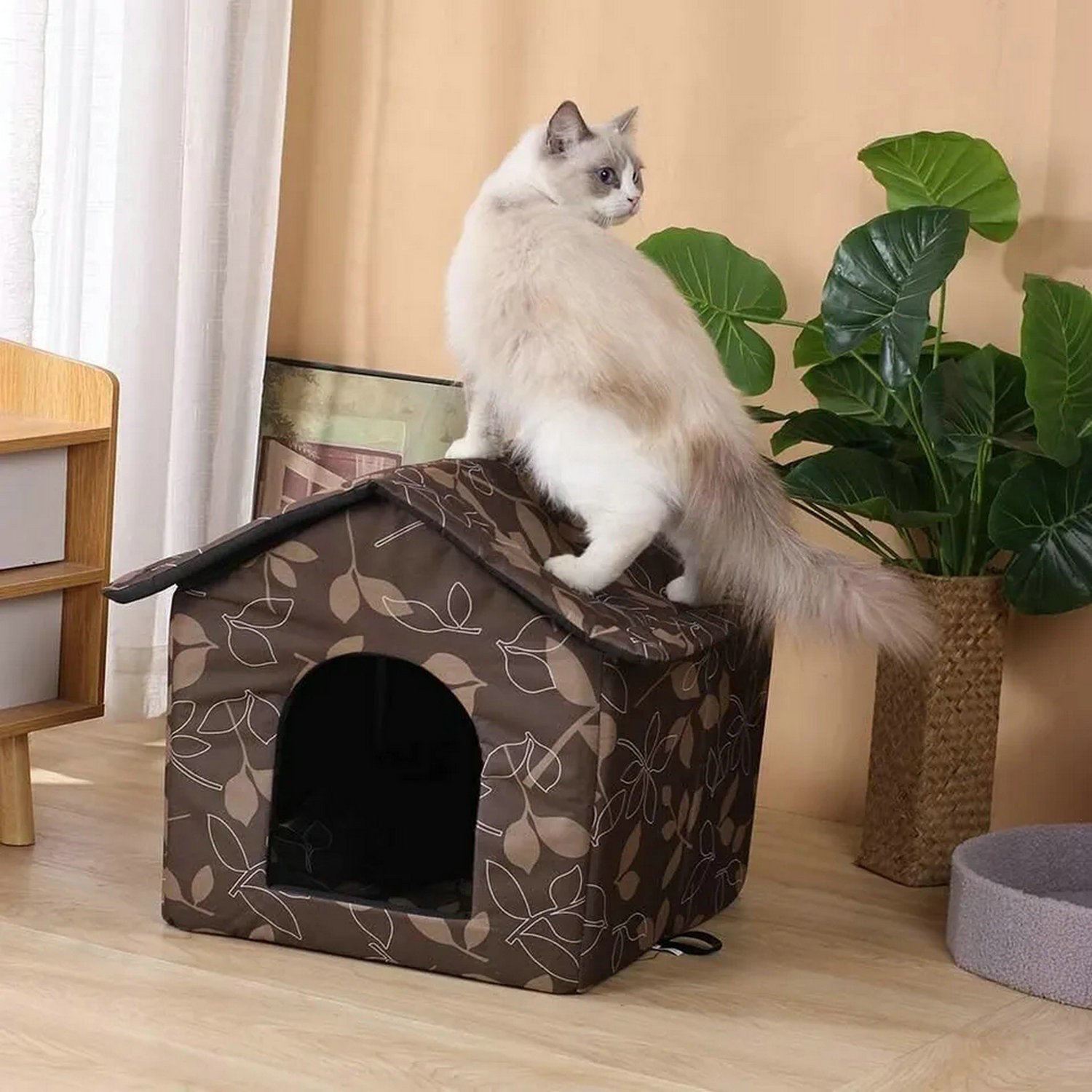 Tucker Murphy Pet™ Desdamona Heated Portable Cat House | Wayfair