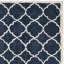 Tapis bleu / ivoire en laine / coton / latex touffeté à la main Carolene-1226196322
