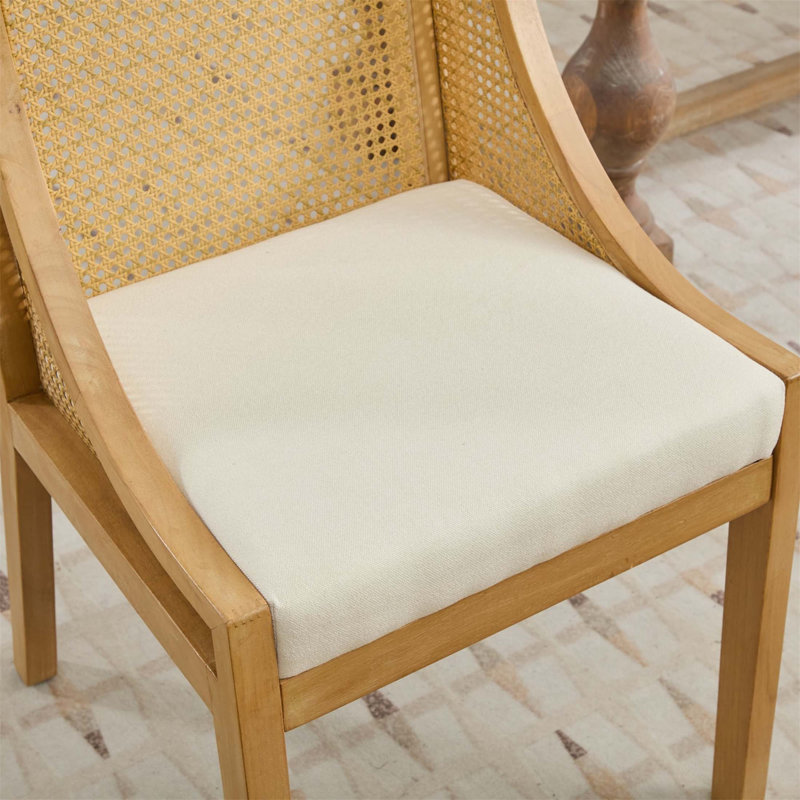 Chaises de salle à manger en rotin avec structure en bois massif, accoudoirs décoratifs et siège rembourré en lin pour les intérieurs de style rustique
