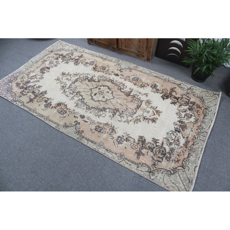 Vintage Turkish Floral Motif Area Rug Handwoven with Elegant Beige and Soft Pastel Colours