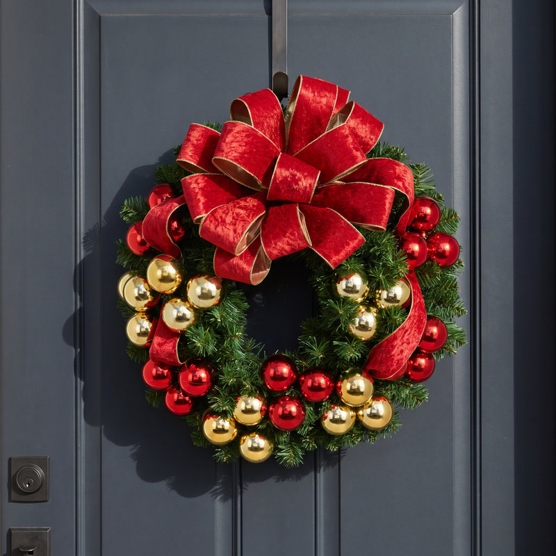 Holiday Evergreen Wreath with Gold and Red Ornaments and Red and Gold Bow