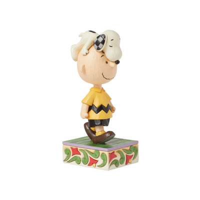 Figurine Peanuts par Jim Shore Snoopy sur la tête de Charlie Brown