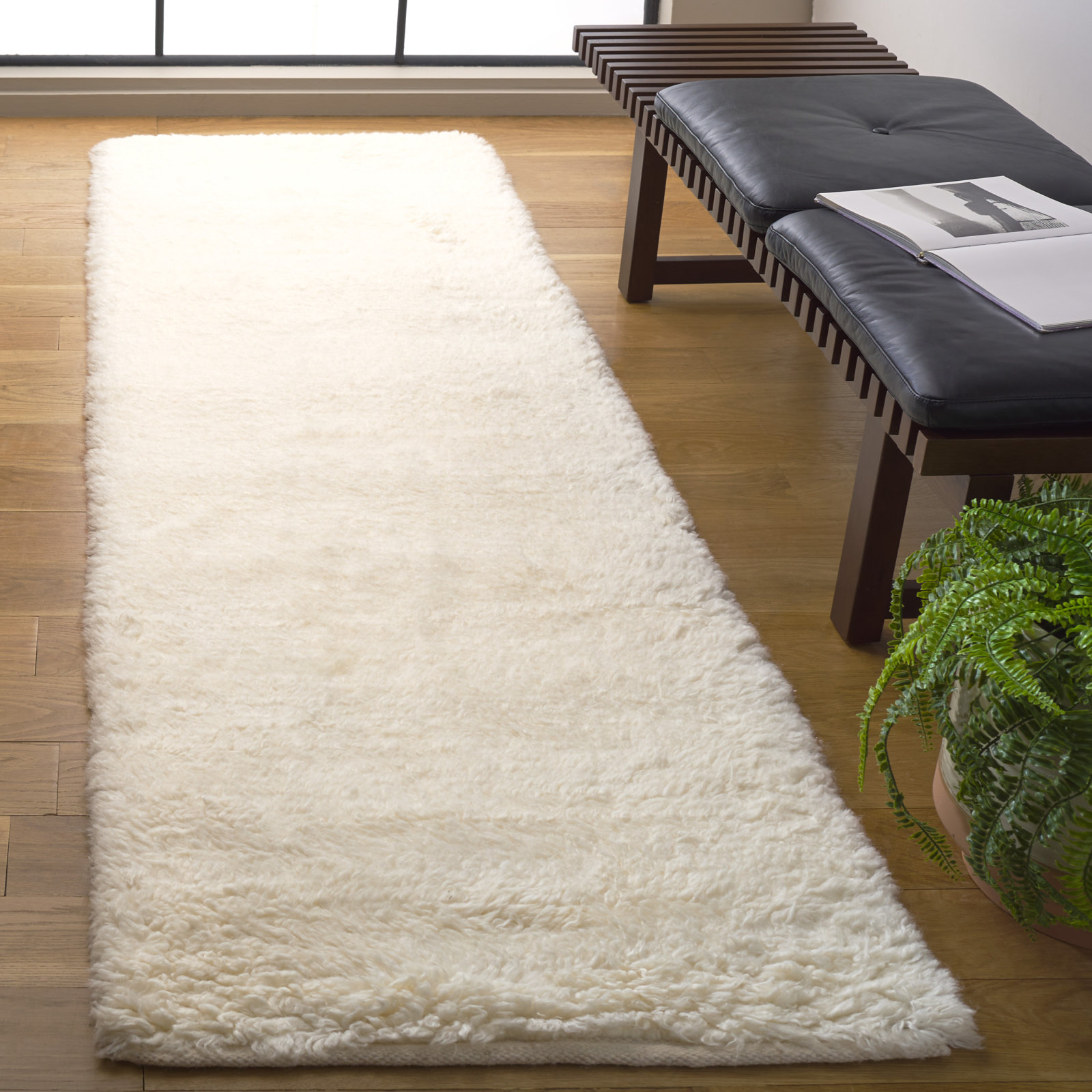 Abriel Ivory Solid Hand-Woven Wool Rug, Runner 2'3" x 8'