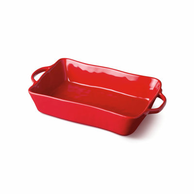 Berry Red Medium Rectangular Baker — A 96-ounce stoneware baking dish in vivid glossy holiday red with ornate handles, perfectly sized for everyday holiday bakes and scaled holiday sides.