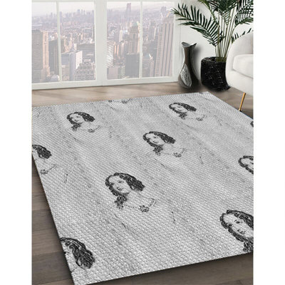 Tapis gris tissé à la machine