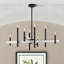 Grand lustre noir 8 lumières avec accents en nickel brossé