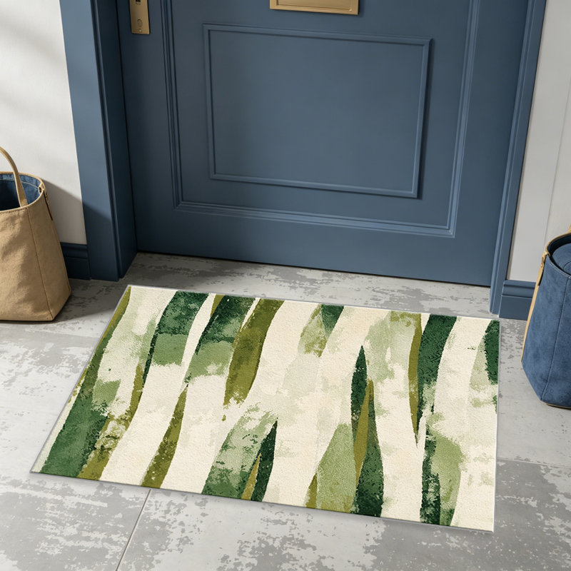 Abstract Green carpet-easy to clean, machine-washable, soft and comfortable; suitable for door mats, kitchens, living rooms, bedrooms, corridors, and laundry areas. Easy to clean, durable carpet for home decoration.