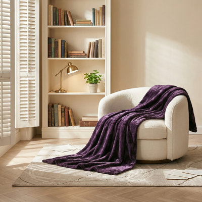 Water-Resistant Bed Blanket. Reversible Sherpa Fleece Throw Blanket for Dogs, Puppies, and Cats. Functions as a Furniture Cover, Protecting Beds, Couches, and Sofas from Liquids and Pet Hair. Color: Dark Purple. Dimensions: 50x60 Inches.