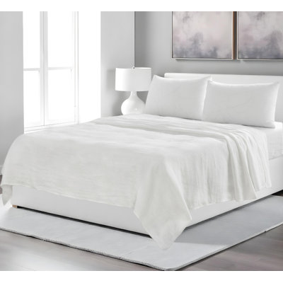 Ensemble de draps en lin ivoire quatre pièces
