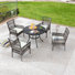 Rusi 4 - Person Wicker Patio Dining Set with Round Table , Cushions Included