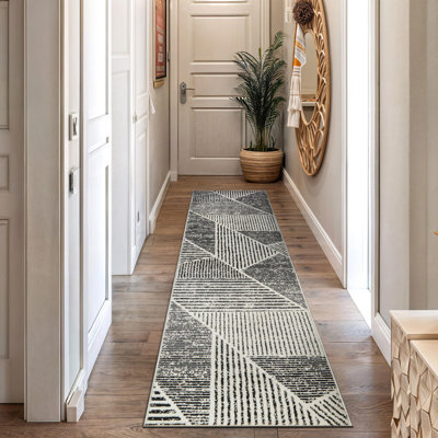 Tapis contemporain délavé à motif géométrique