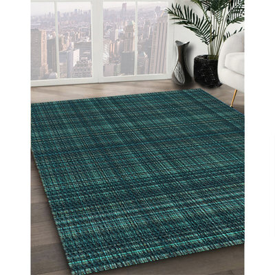 Tapis bleu tissé à la machine