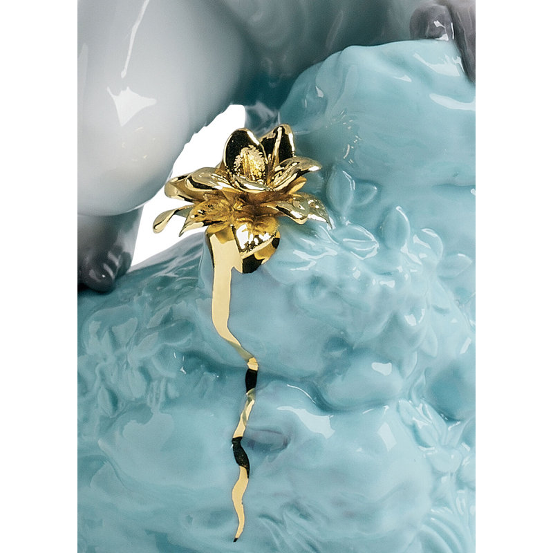 Figurine de singe curieux sur une roche, Turquoise