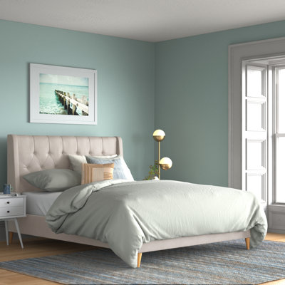 Charlyee Upholstered Wingback Bed