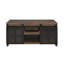 Table basse en chêne rustique et noir avec portes de grange coulissantes, rangement spacieux et décorations modernes en métal