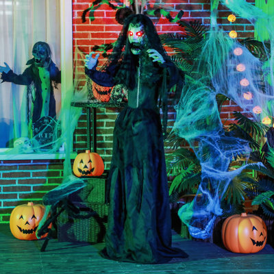 Accessoire animé de fantôme d'Halloween avec activation sonore, yeux rouges et voix effrayante pour une utilisation intérieure et extérieure couverte