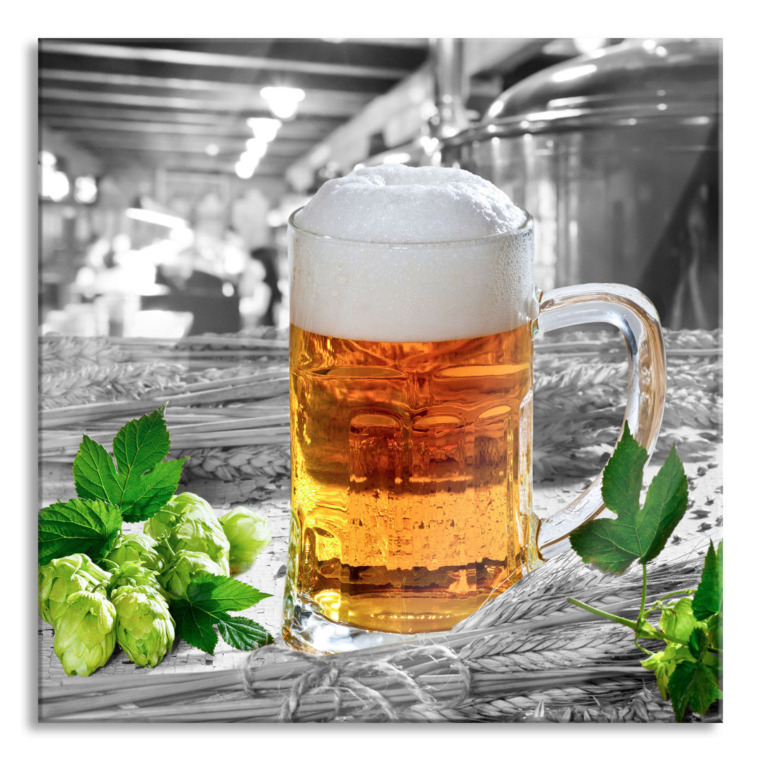 Glasbild Frisches Bier mit Schaumkrone