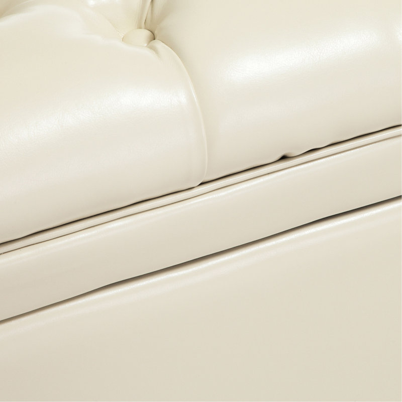 Rangement en cuir teinté pour les couvertures et les coussins de couleur neutre avec des coussins décoratifs et faciles d'accès,