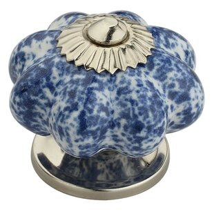 Elegantly crafted Mother of Pearl cabinet knob encased in a brass