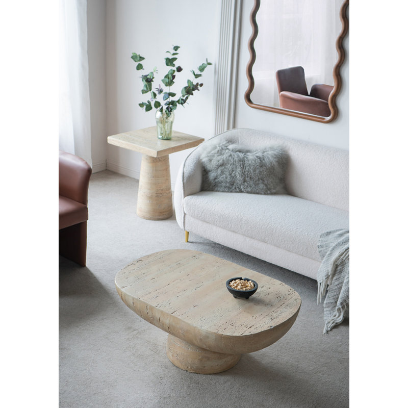 Table basse ovale avec piédestal arrondi