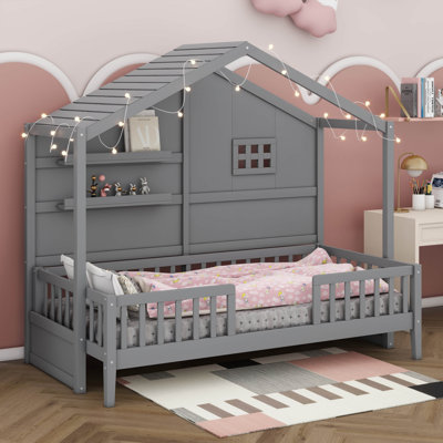 Twin-Sized House Bed With Shelving Units, Featuring A Window And A Sparkling Light Strip On The Roof