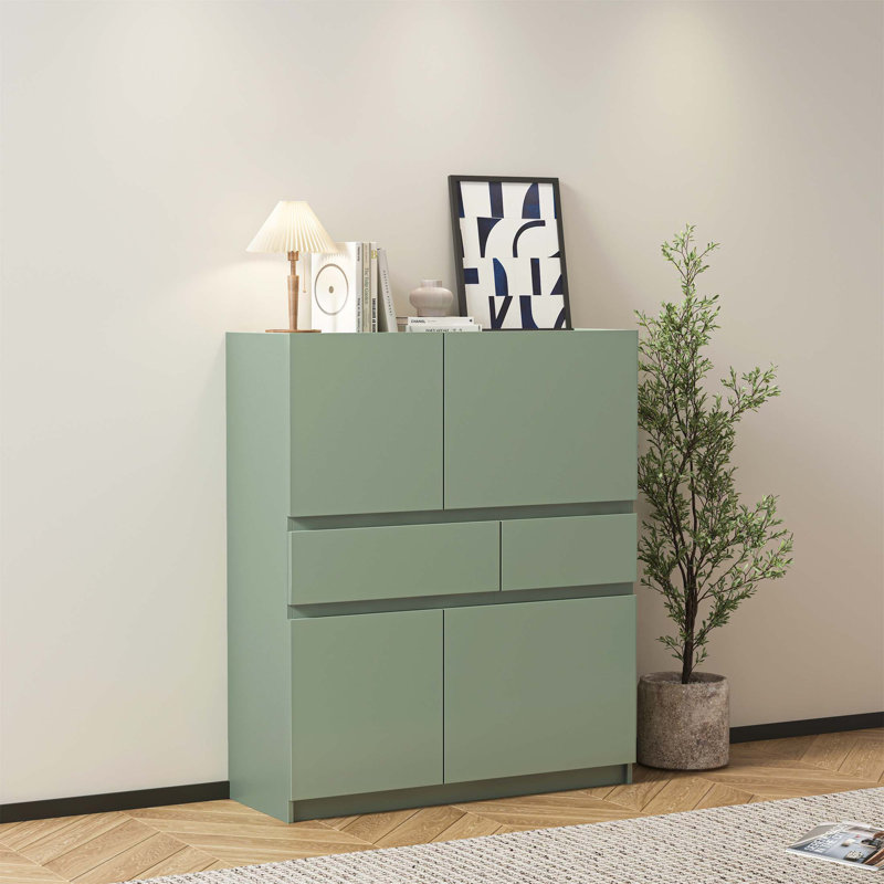 Armoire de rangement spacieuse en bois vert avec 4 portes et 2 tiroirs pour une utilisation polyvalente à la maison