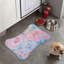 Tapis pastel en forme d'os 1 pièce